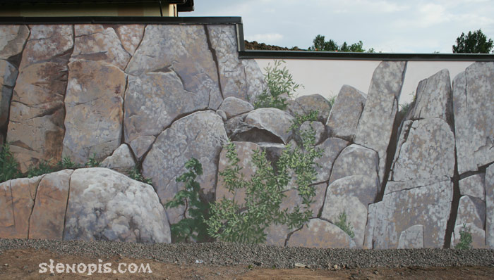 Деталь росписи стены. Объемные каменные глыбы и растения