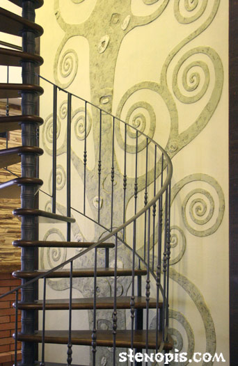 Детали декоративного панно с рельефной лепкой на стене
